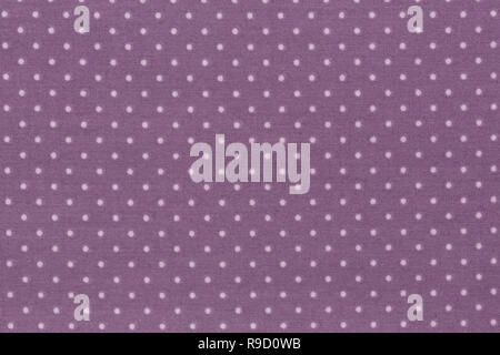 Purple fabric and white tiny polka dots background. Stock Photo