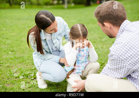 Comforting little daughter Stock Photo
