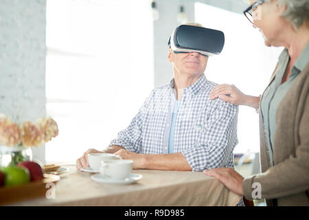 Breakfast in virtual reality Stock Photo