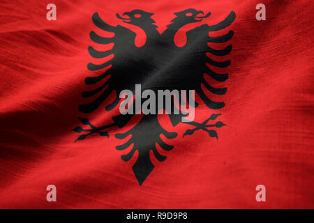 Closeup of Ruffled Albania Flag, Albania Flag Blowing in Wind Stock Photo