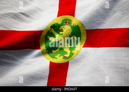 Closeup of Ruffled Alderney Flag, Alderney Flag Blowing in Wind Stock Photo