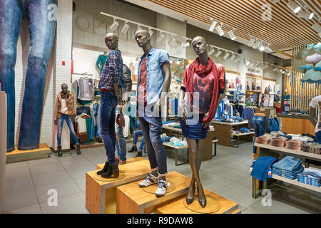 DUBAI, UAE - CIRCA OCTOBER, 2014: interior shot of apparel store in The Dubai Mall Stock Photo