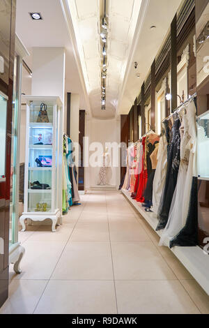 DUBAI, UAE - CIRCA OCTOBER, 2014: interior shot of apparel store in The Dubai Mall Stock Photo