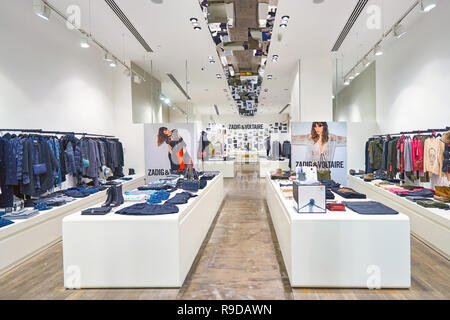 DUBAI, UAE - CIRCA OCTOBER, 2014: interior shot of apparel store in The Dubai Mall Stock Photo