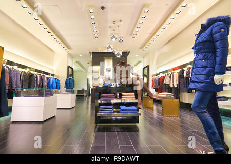 DUBAI, UAE - CIRCA OCTOBER, 2014: interior shot of apparel store in The Dubai Mall Stock Photo