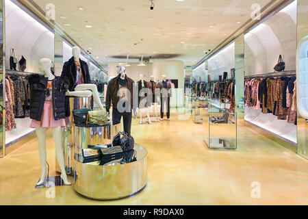 DUBAI, UAE - CIRCA OCTOBER, 2014: interior shot of apparel store in The Dubai Mall Stock Photo