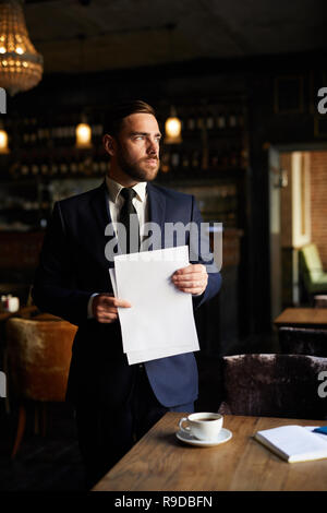 Ambitious entrepreneur thinking of plans Stock Photo