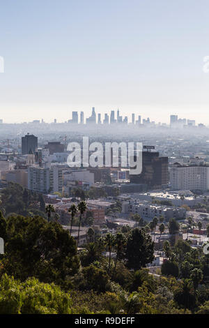 Los Angeles, California, USA - December 16, 2018:  Vertical morning cityscape view towards Hollywood and downtown LA from hiking trail at Runyon Canyo Stock Photo