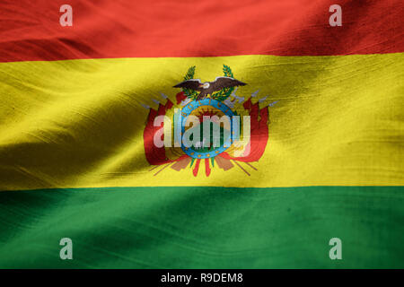 Closeup of Ruffled Bolivia Flag, Bolivia Flag Blowing in Wind Stock Photo