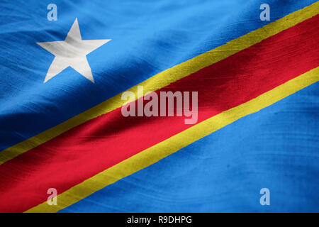 Closeup of the Ruffled Democratic Republic of the Congo Flag, the Democratic Republic of the Congo Flag Blowing in Wind Stock Photo