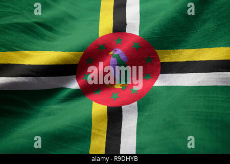 Closeup of Ruffled Dominica Flag, Dominica Flag Blowing in Wind Stock Photo