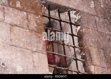 Aleppo, Syria. 22nd Dec, 2018. A Syrian worker fixes a window of the covered Souk al-Saqatiyya in Aleppo, northern Syria, on Dec. 19, 2018. In Syria's northern Aleppo city, the determination of the residents to rebuild their lives and city is stronger than the massive destruction that has befallen them. Two years since its liberation, people have already rolled up their sleeves and started fixing the destruction in the ancient walled marketplace in the city, not discouraged by the devastation. Credit: Ammar Safarjalani/Xinhua/Alamy Live News Stock Photo
