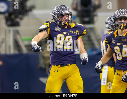 Arlington, Texas, USA. 12th Dec, 2018. Highland Park's Grant Gallas #92 celebrates a sack during the UIL Texas state championships football game between the Highland Park Scots and the Shadow Creek Sharks at AT&T Stadium in Arlington, Texas. Kyle Okita/CSM/Alamy Live News Stock Photo