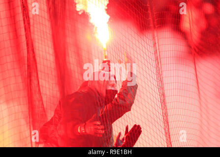 Aue, Germany. 23rd Dec, 2018. Soccer: 2nd Bundesliga, 18th matchday, FC Erzgebirge Aue - 1st FC Union Berlin in the Erzgebirgsstadion. Fans of Berlin ignite Bengalos in the guest block. Credit: Daniel Schäfer/dpa - IMPORTANT NOTE: In accordance with the requirements of the DFL Deutsche Fußball Liga or the DFB Deutscher Fußball-Bund, it is prohibited to use or have used photographs taken in the stadium and/or the match in the form of sequence images and/or video-like photo sequences./dpa/Alamy Live News