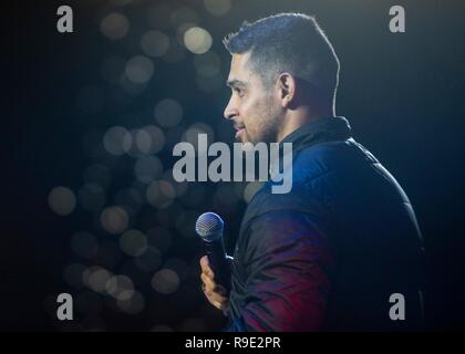 Manama, Bahrain. 21st Dec, 2018. Actor Wilmer Valderrama takes part in the Joint Chiefs USO Christmas Show for deployed service members at Naval Support Activity Bahrain December 22, 2018 in Manama, Bahrain. This year’s entertainers include actors Milo Ventimiglia, Wilmer Valderrama, DJ J Dayz, Fittest Man on Earth Matt Fraser, 3-time Olympic Gold Medalist Shaun White, Country Music Singer Kellie Pickler, and comedian Jessiemae Peluso. Credit: Planetpix/Alamy Live News Stock Photo