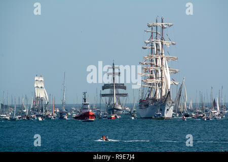 A flotilla of boats in Falmouth for the departure of the Tall Ships, on their way to Greenwich. Stock Photo