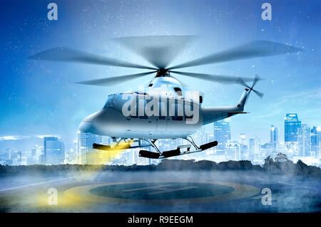 Small helicopter landing on the helipad in the city Stock Photo