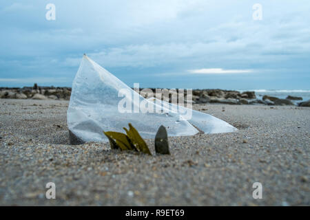 Plastic objects washed up on beach or in the street Stock Photo