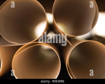 close-up: Looking into white paper rools Stock Photo