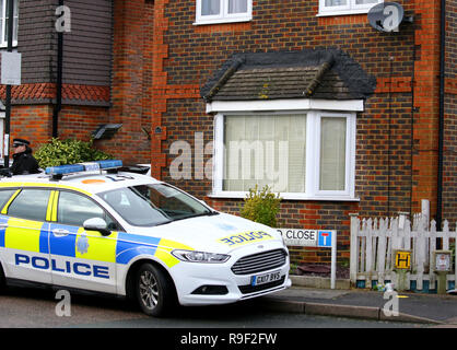 Police outside the home in Crawley, West Sussex, of 47-year-old man and 54-year-old woman who were released without charge in connection with the drone incidents at Gatwick Airport. Stock Photo