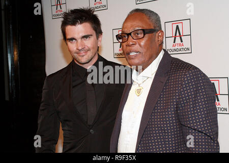 NEW YORK - FEBRUARY 22:  Musicians Juanes and Sam Moore attend the 2010 AFTRA AMEE Awards at The Grand Ballroom at The Plaza Hotel on February 22, 2010 in New York, New York.  (Photo by Steve Mack/S.D. Mack Pictures) Stock Photo