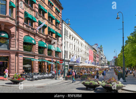 Cafes, bars, restaurants and shops on Karl Johans gate in the city centre, Oslo, Norway Stock Photo