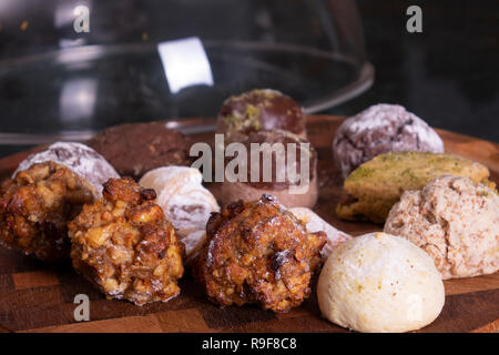 Variety of cookies on wooden plate Stock Photo