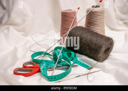 Items for knitting and sewing, yarn, knitting needles Stock Photo