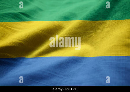 Closeup of Ruffled Gabon Flag, Gabon Flag Blowing in Wind Stock Photo