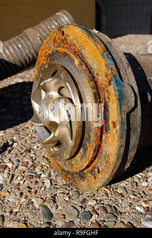 Impeller of a water pump. The impeller is heavily worn by stones ...