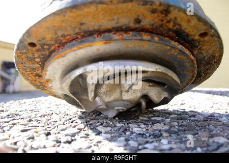Impeller of a water pump. The impeller is heavily worn by stones ...