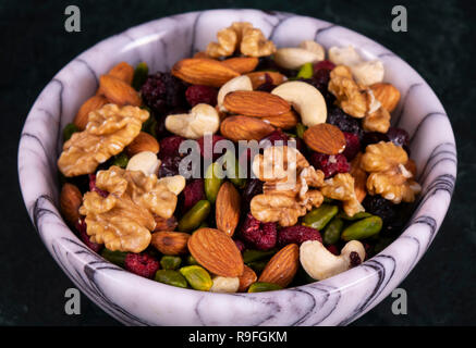Nuts mix in a marble plate Stock Photo