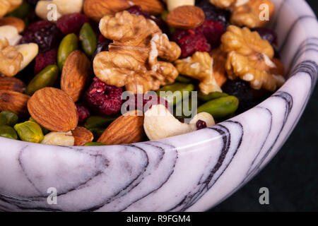 Nuts mix in a marble plate Stock Photo