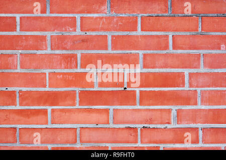 Empty red brick wall textured background. Stock Photo