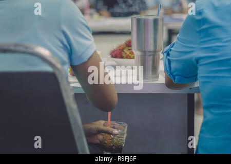 Female teachers meeting for plan teaching in school, Selective focus on hand. Stock Photo