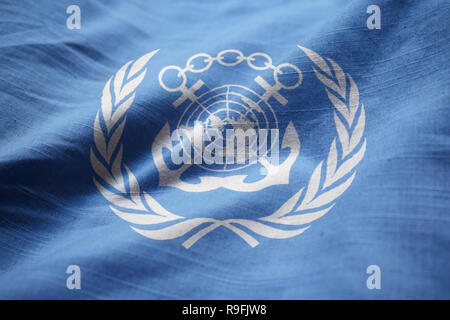 Closeup of Ruffled International Maritime Organization Flag, International Maritime Organization Flag Blowing in Wind Stock Photo