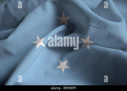 Closeup of Ruffled Micronesia Flag, Micronesia Flag Blowing in Wind Stock Photo