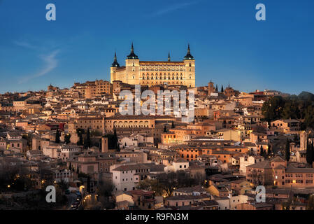 Toledo, Spain old town cityscape and Alcazar at dusk Stock Photo