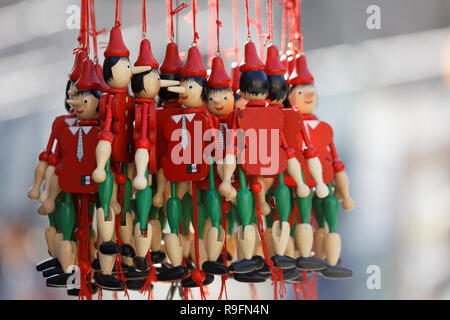 Pinocchio dummies in the Italian souvenir market Stock Photo