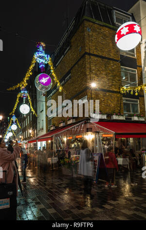 LONDON - DECEMBER 23, 2018: St Christopher's Place Piazza and the surrounding streets just off famous London's Oxford Street are decorated for Christm Stock Photo