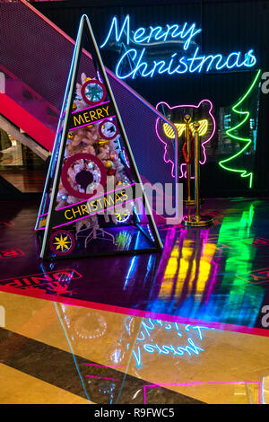 Neon Merry Christmas sign in shop window London England UK Stock Photo