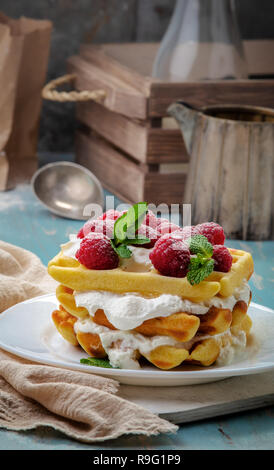 Homemade waffles with raspberries Stock Photo