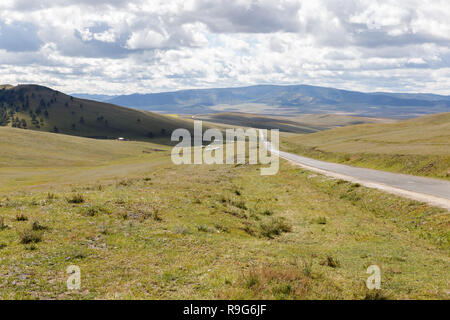 asphalt road Darkhan-Ulaanbaatar in Mongolia Stock Photo
