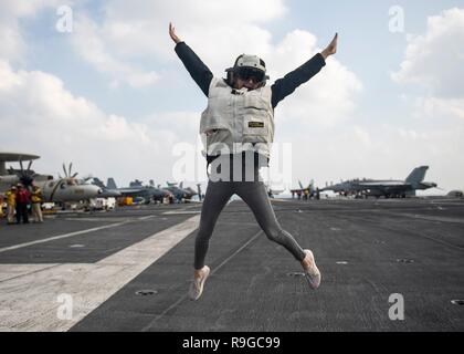USS Stennis Air Craft Carrier, Oman. 23rd Dec, 2018. Country Music Singer Kellie Picklerjokes around on the flight deck of the aircraft carrier USS John C. Stennis before taking part in the Joint Chiefs USO Christmas Show for deployed service members December 23, 2018 in the Persian Gulf. This year's entertainers include actors Milo Ventimiglia, Wilmer Valderrama, DJ J Dayz, Fittest Man on Earth Matt Fraser, 3-time Olympic Gold Medalist Shaun White, Country Music Singer Kellie Pickler, and comedian Jessiemae Peluso. Credit: Planetpix/Alamy Live News Stock Photo