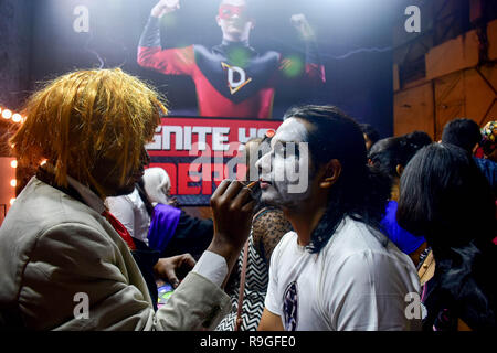 Mumbai, India. 23rd Dec, 2018. A visitor gets ready during the second day of the 8th 'Mumbai Comic Con 2018' at Bombay Exhibition Center in Mumbai. Credit: Azhar Khan/SOPA Images/ZUMA Wire/Alamy Live News Stock Photo