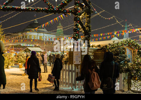 Moscow, the Russian Federation - December 24, 2018:  Muscovites walking on streets of the downtown decorated and illuminated for Christmas and New Year's holidays. Credit: Sergey Podkolzin/Alamy Live News Stock Photo