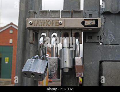 Secure gates, gate security using multiple locks and padlocks, Tayhope Multi-lock system, on a sub-station gate, Western Power distribution,Bridgwater Stock Photo