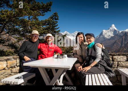 Nepal, Everest Base Camp Trek, Everest View Hotel, visitors enjoying panoramic view of Everest Stock Photo