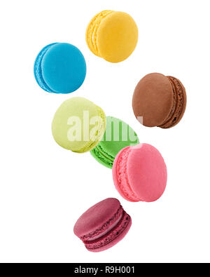 Falling macaroons isolated on white background, clipping path, full depth of field Stock Photo