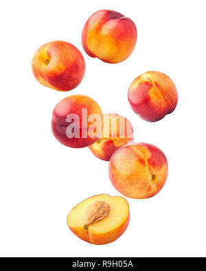Falling Nectarine or peach isolated on white background, clipping path, full depth of field Stock Photo